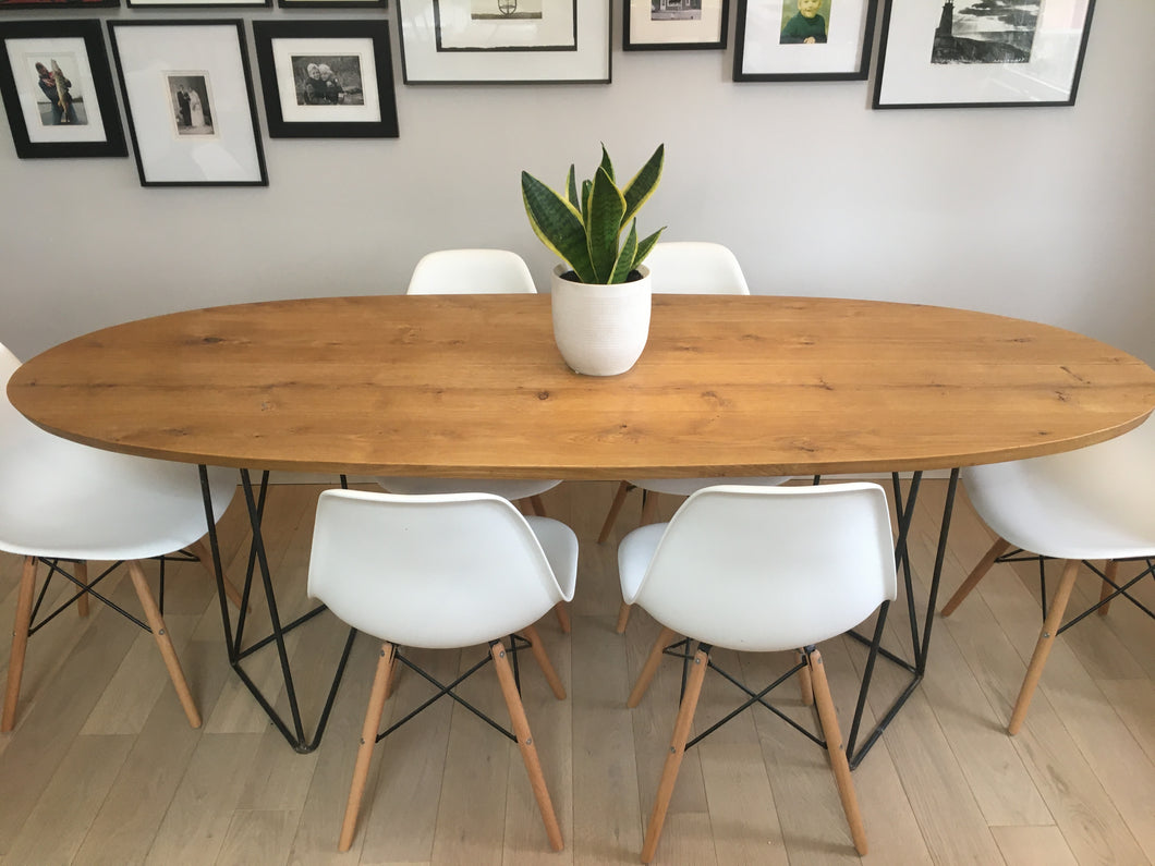 Surfboard shaped white oak dining table